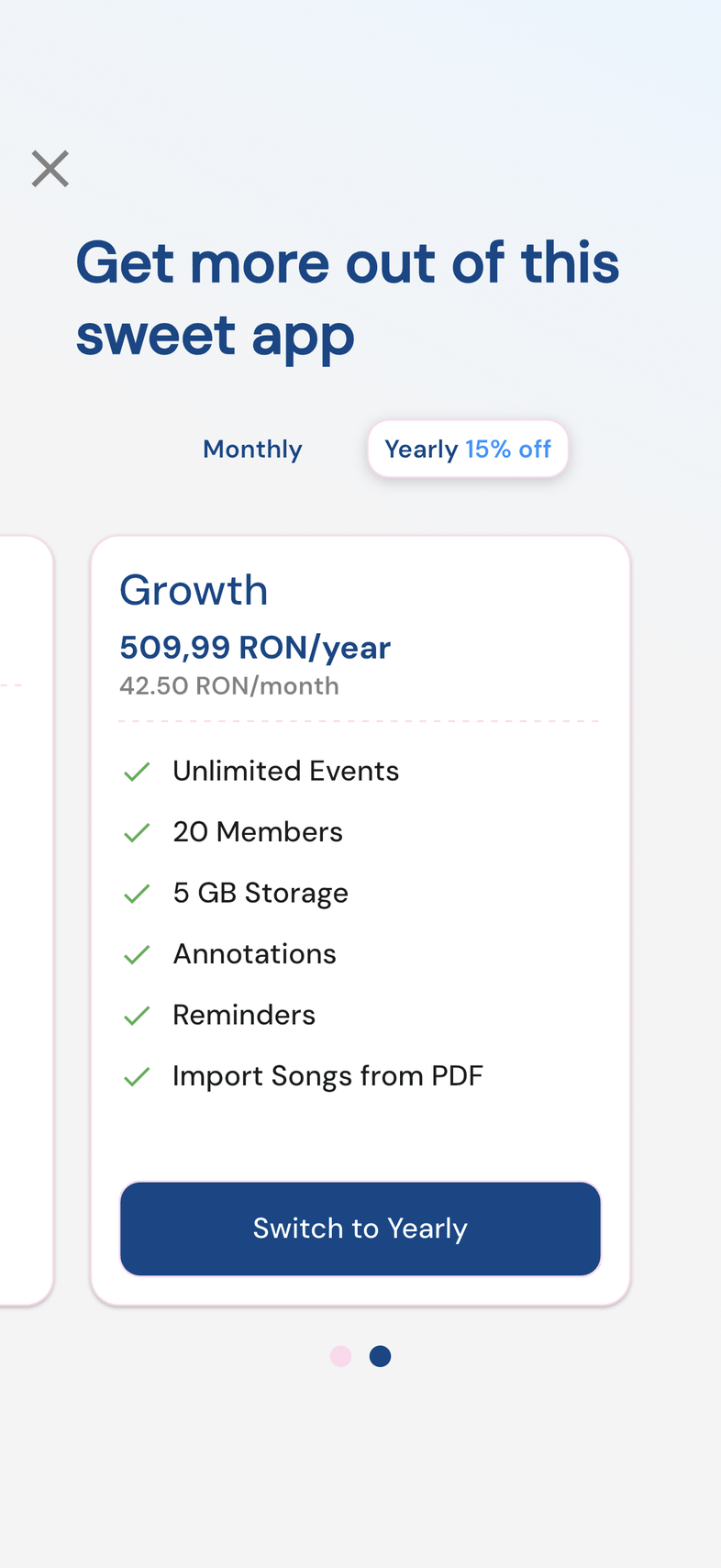 Plans screen on mobile with Yearly 15% off selected, showing the per-month price on the cards