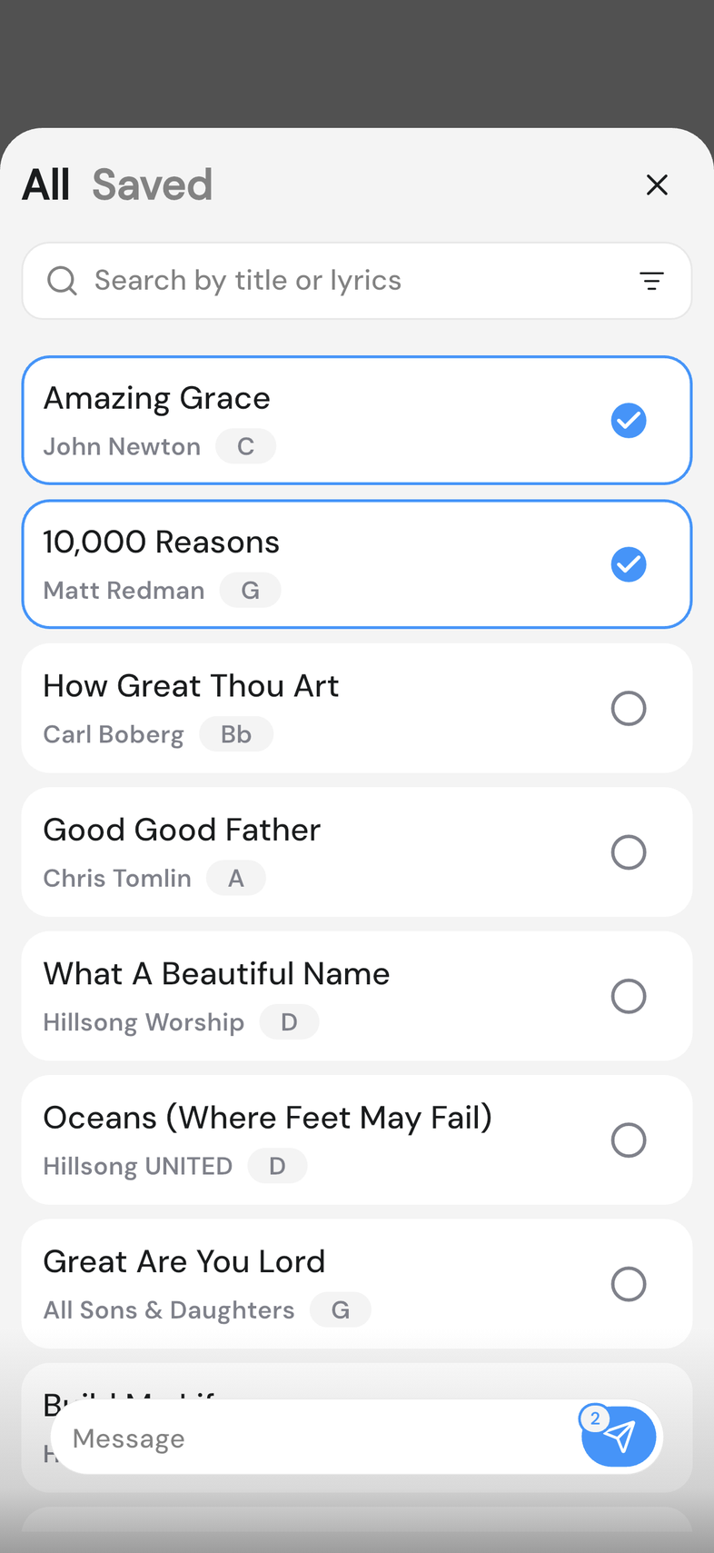 Songs picker open in a chat with two songs selected