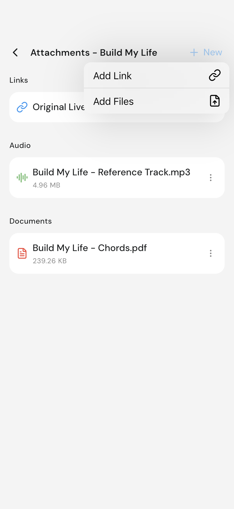 Attachments screen for a song with the plus menu open showing Add Link and Add Files
